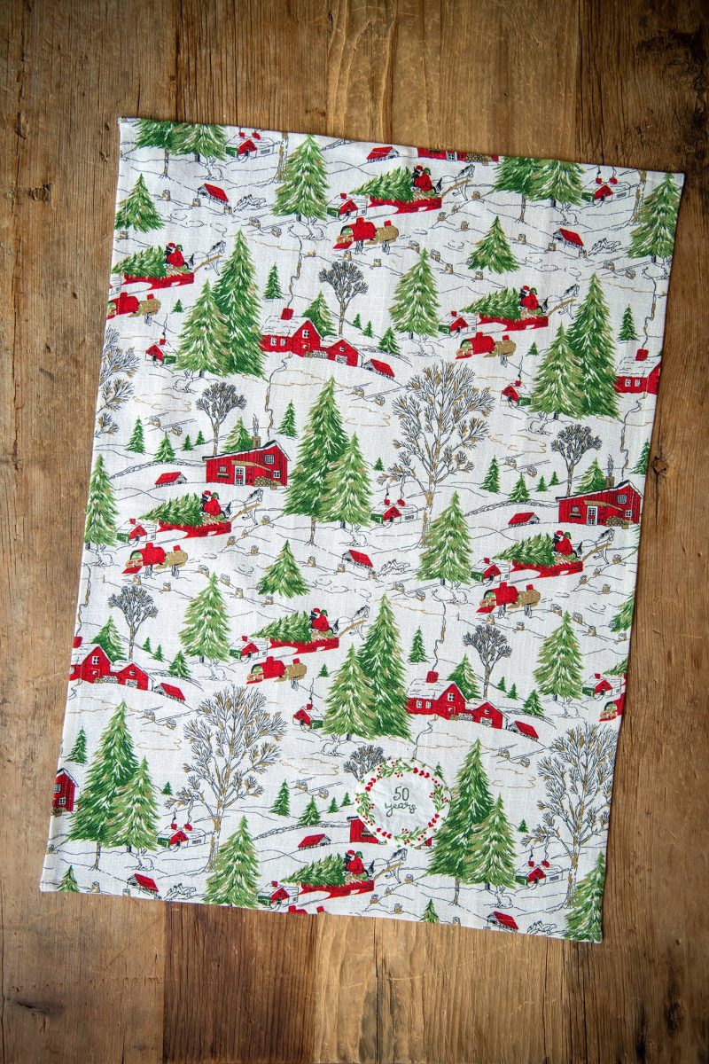 christmas cottage tea towel 50 years 22